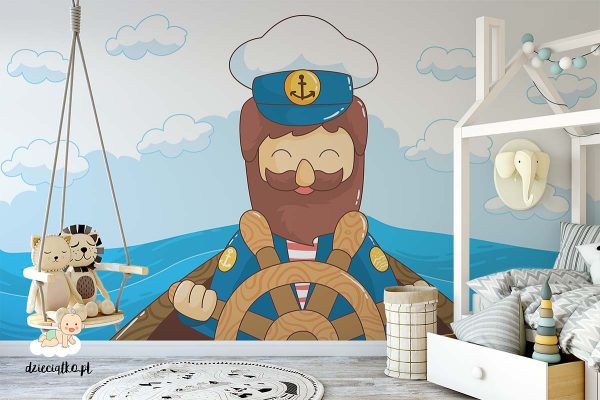 sailor at the helm with the waves in the background - children’s wall mural