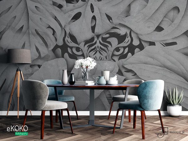 tiger’s head emerging from behind the leaves in shades of gray - wall mural