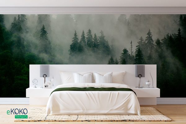 Foggy green fir forest on a hill - wall mural
