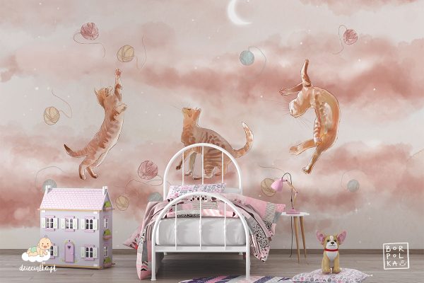 three cats play with colorful balls of yarn on a beige background - children’s wall mural