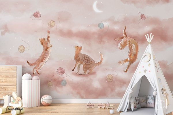 three cats play with colorful balls of yarn on a beige background - children’s wall mural