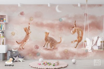 three cats play with colorful balls of yarn on a beige background - children’s wall mural