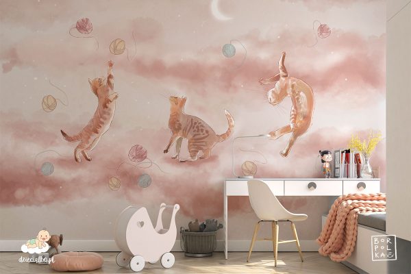 three cats play with colorful balls of yarn on a beige background - children’s wall mural