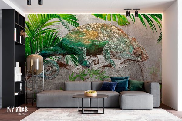 chameleon on a branch among tropical plants against a concrete background - wall mural