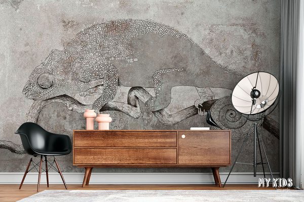 gray chameleon on a branch against a concrete background - wall mural