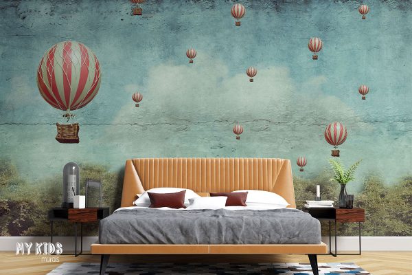 hot air balloons float above the forest - wall mural