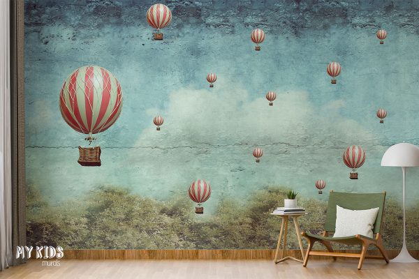 hot air balloons float above the forest - wall mural