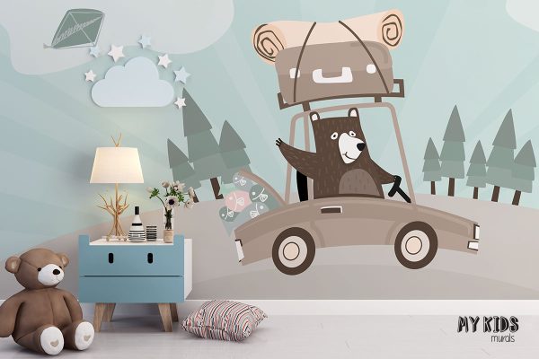 teddy bear is driving car with luggage while balloons are flying in the sky - children’s wall mural